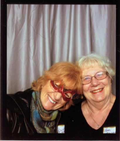 Masked stranger with Patti (Pedersen) Zawadski cuttin up in one of those old photo booths!